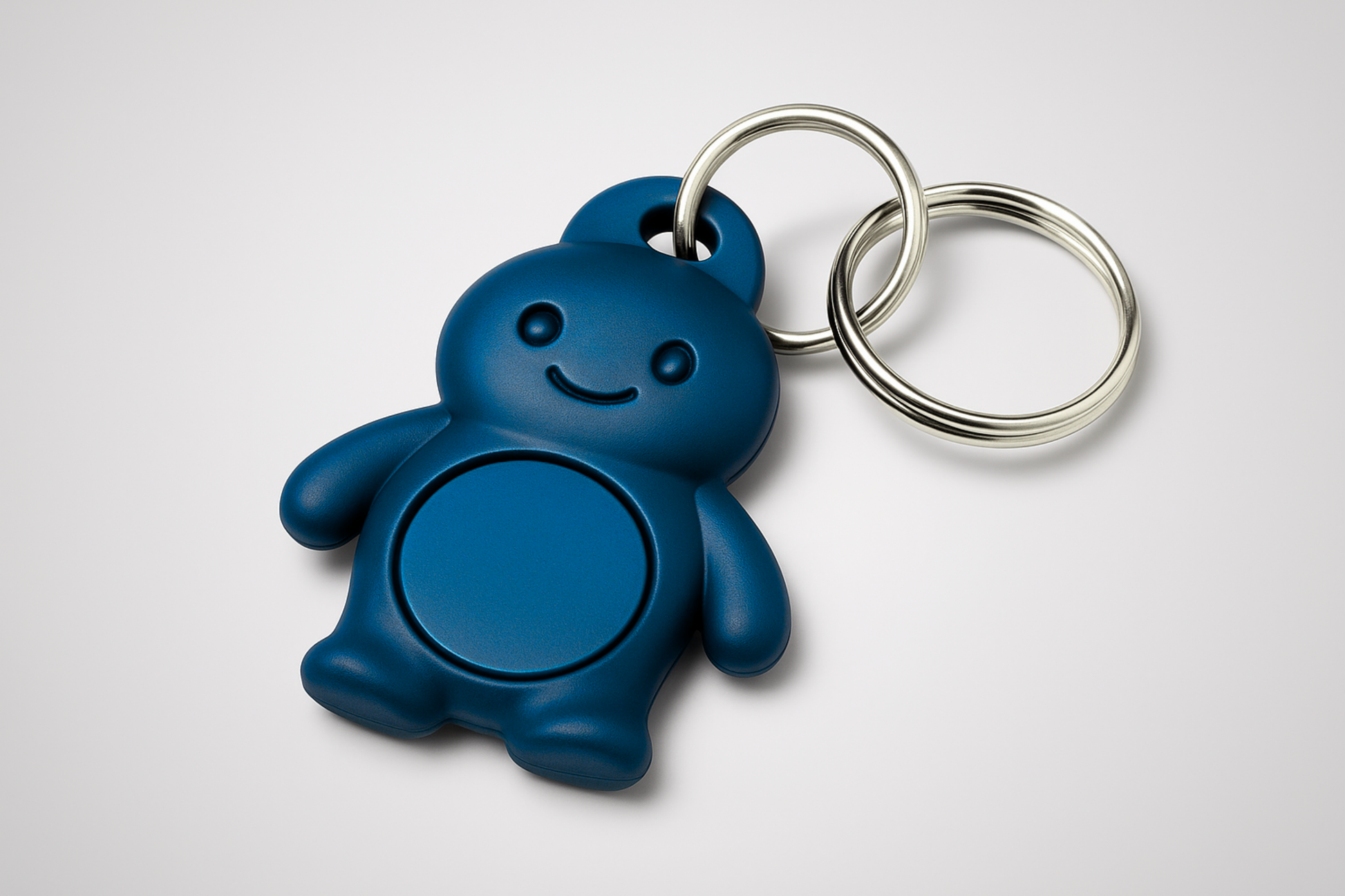 A photo of a key fob shaped like a mascot