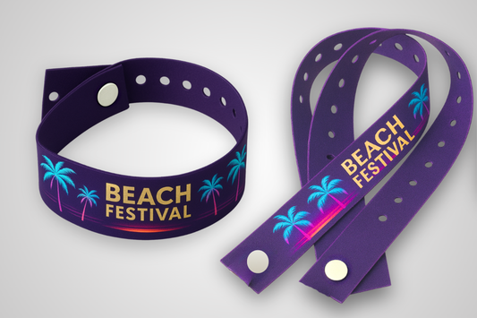 A photo of a colorful fabric wristband with snap lock