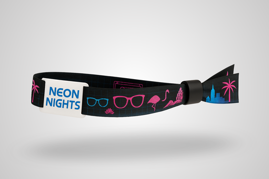 A photo of a fabric wristband with a plastic RFID slider and color print