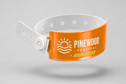 A photo of W-Vinyl Wristbands with print from JM Band®. Purchase Vinyl Wristbands in Orange here.